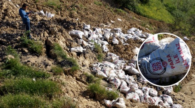  Yoksullara dağıtılacak yanmayan tonlarca kömür dereye atıldı